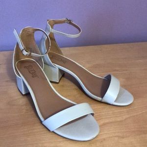 Brash white heels